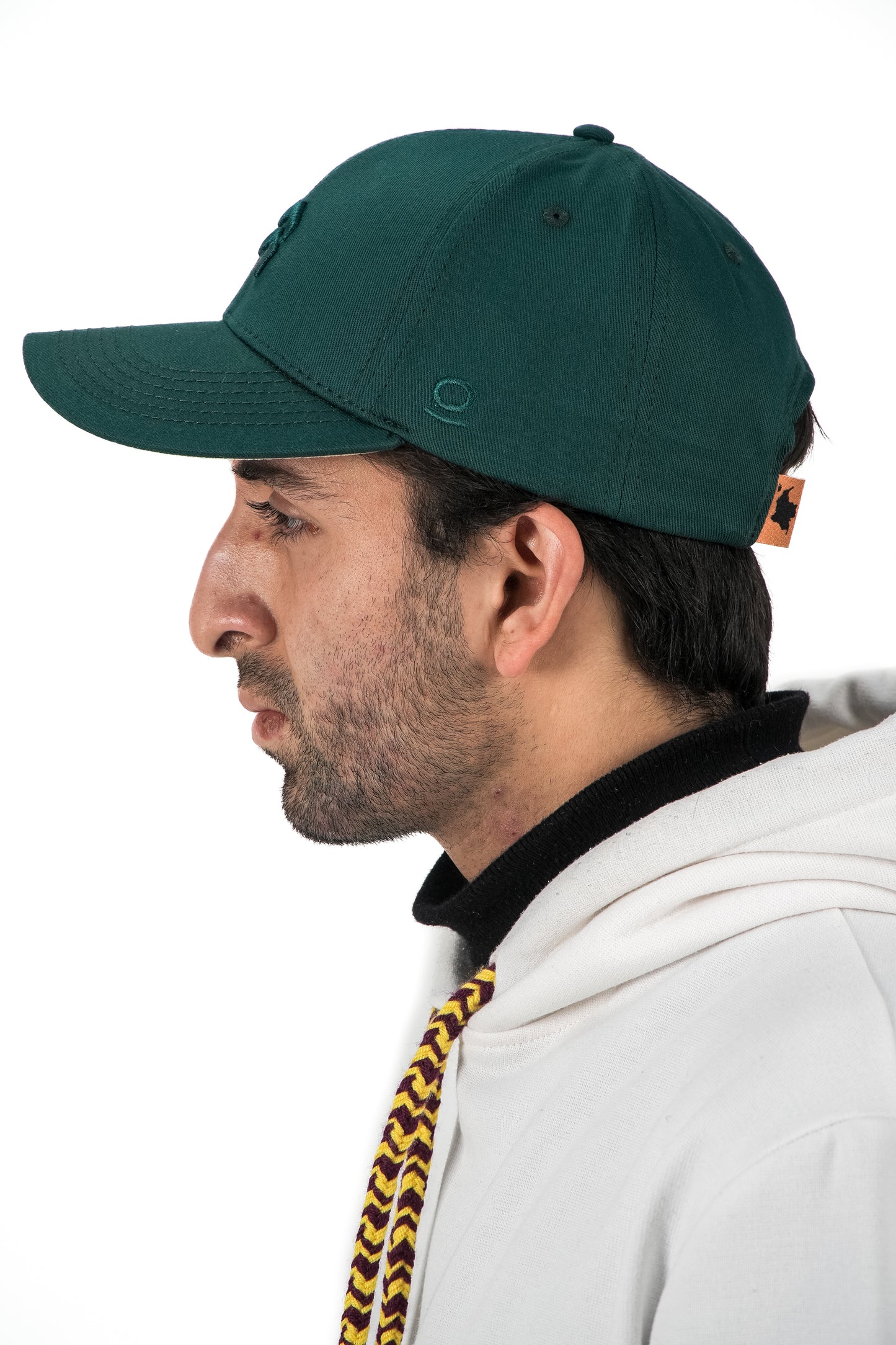 GORRA ORÍGENES VERDE BOTELLA AL TONO - FRENTE DURO