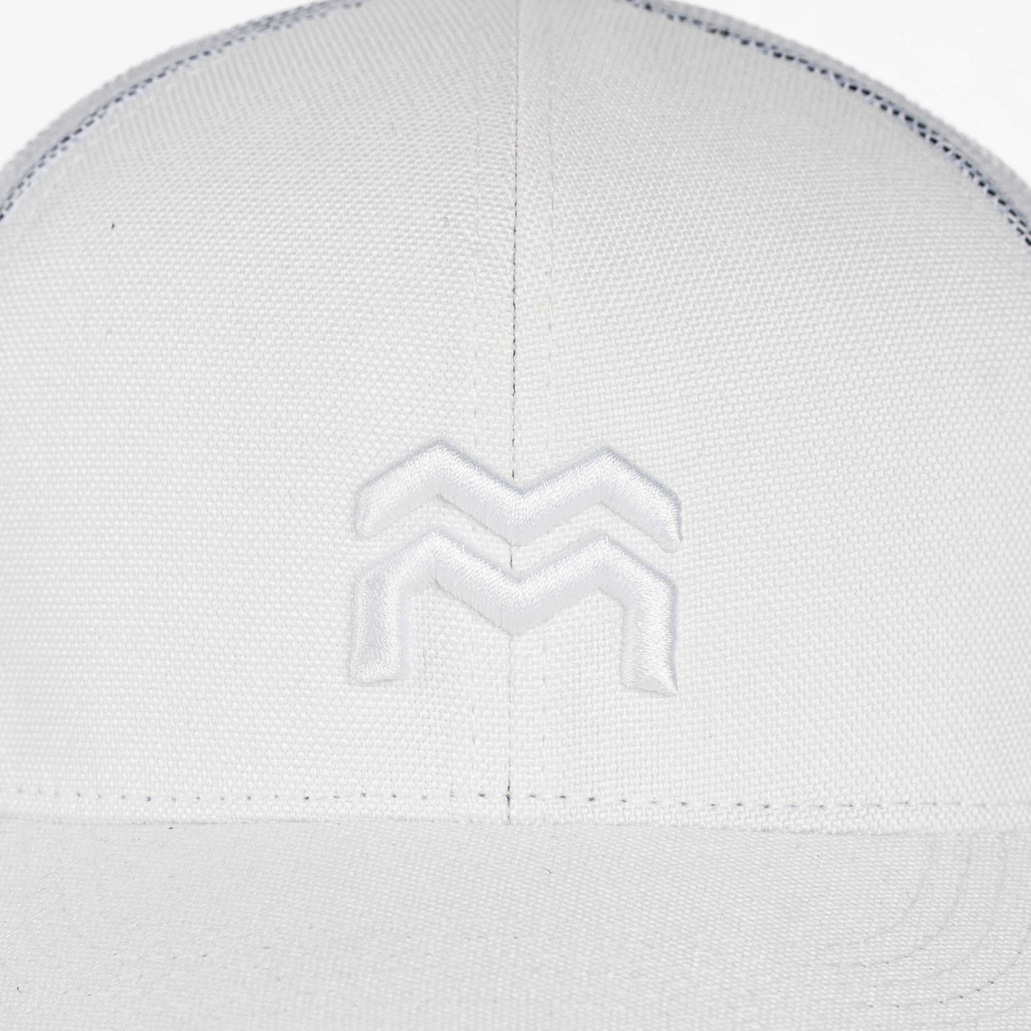 GORRA TRUCKER ORÍGENES BLANCO - FRENTE DURO