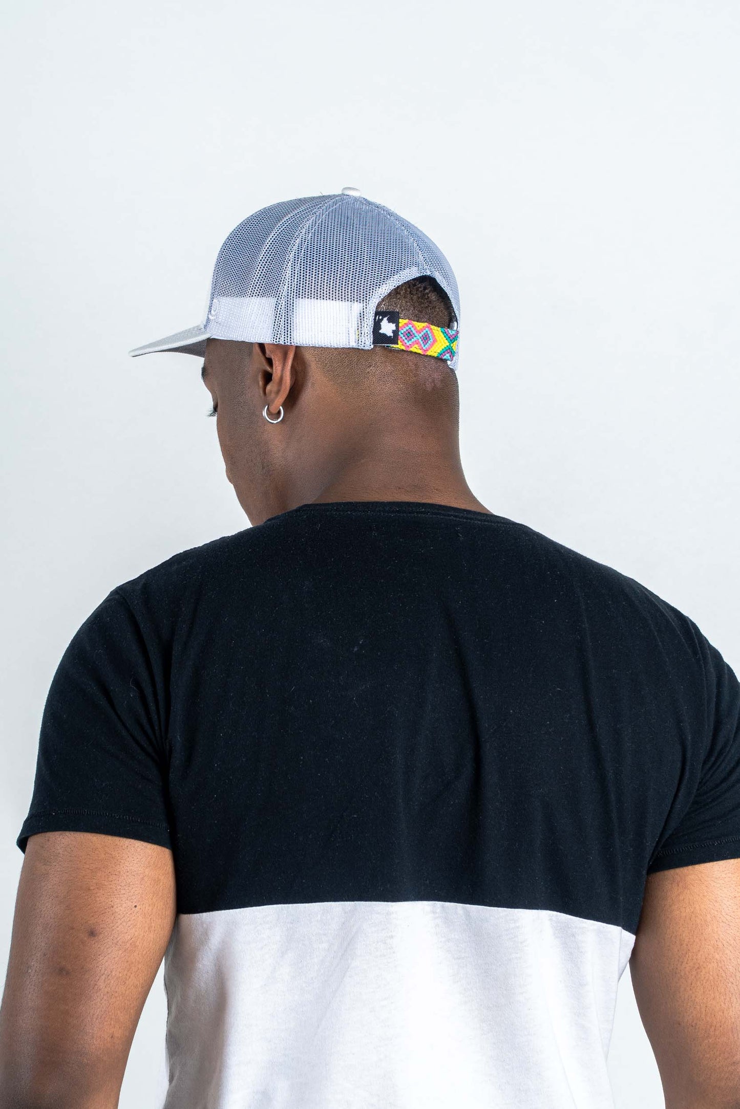 GORRA TRUCKER ORÍGENES BLANCO - FRENTE DURO
