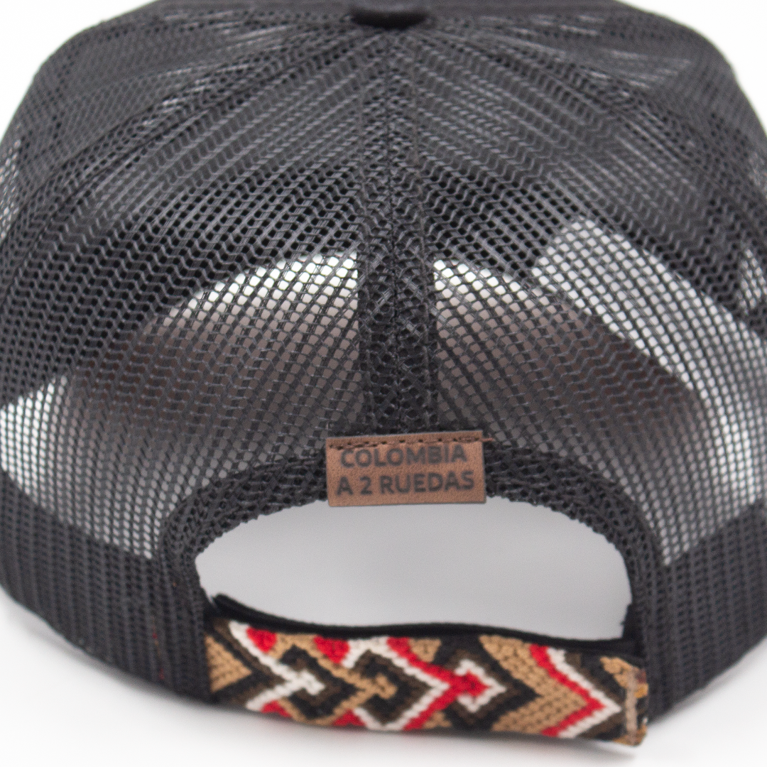GORRA TRUCKER COLOMBIA EN 2 RUEDAS ALTO DE PALMAS - FRENTE DURO