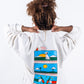 CREWNECK CREMA UNISEX SANARA MAÑANA - DETALLES