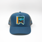 GORRA TRUCKER COLOMBIA EN 2 RUEDAS ALTO DE PATIOS - FRENTE DURO